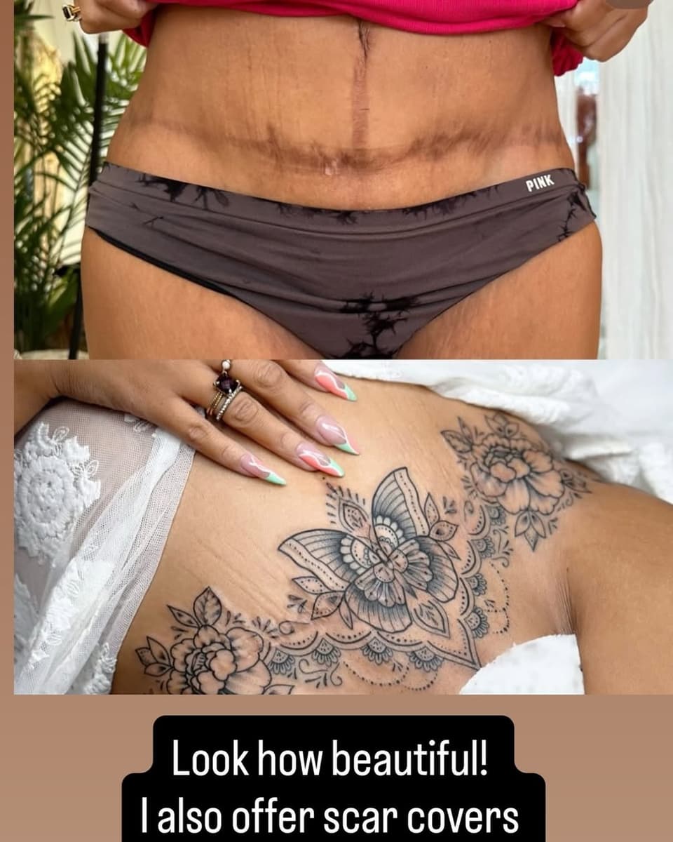 Intricate floral and butterfly tattoo in black ink on shoulder and upper back, displayed on tan skin with manicured nails visible.