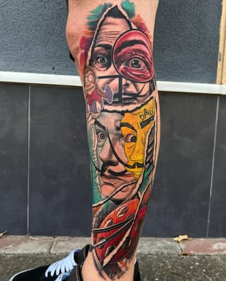 Colorful leg sleeve tattoo featuring stacked surreal faces with masks and artistic elements in red, yellow, green, and black ink.