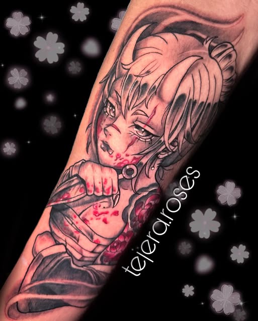 Anime girl character tattoo on forearm with pink accents, holding a weapon, featuring detailed linework and shading with floral elements.